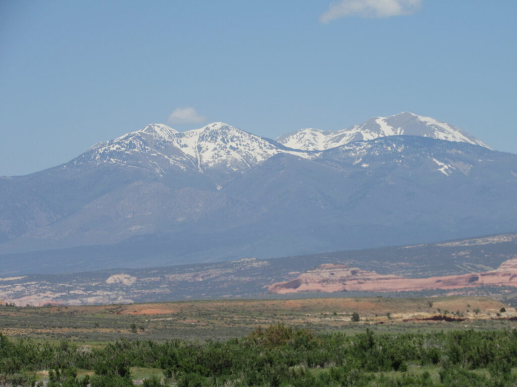 view of a snow capped mountain range