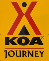 Kamgrounds of America KOA Journey logo. Yellow background with black text