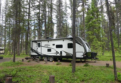 RV at a campsite in the forest