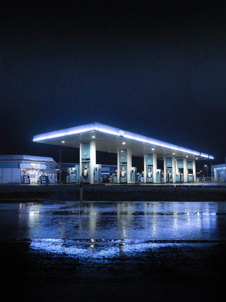 fuel station at night to illustrate RV hidden costs